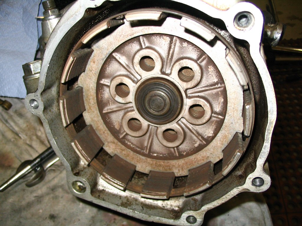 With the large snap ring removed, you can withdraw all of the clutch and intermediate plates.