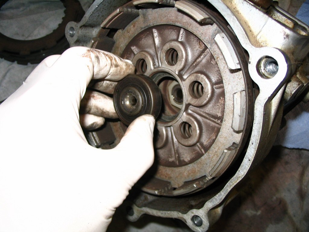 Another view of the throw out bearing (MG# 92204217) being removed.