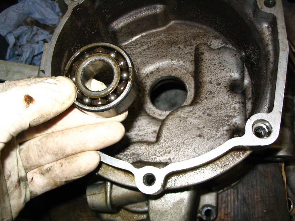 Press out the front bearing for the input shaft.