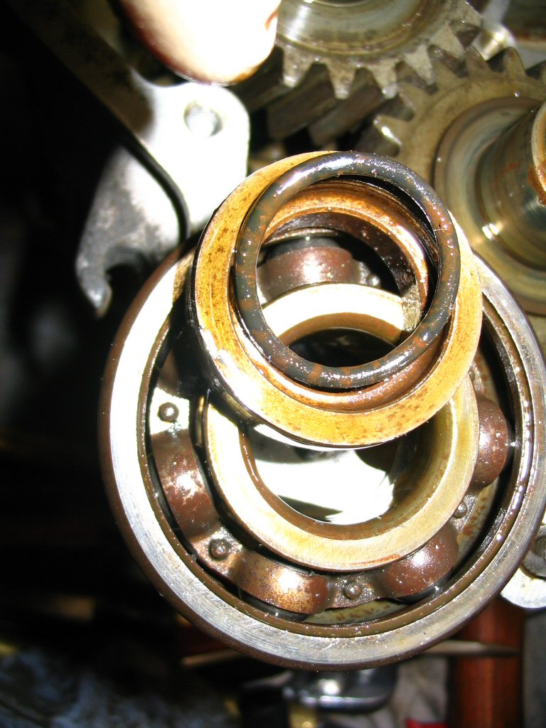 Here is where the O-ring (MG# 90706222) fits: within the front recess of the spacer that the seal runs on.