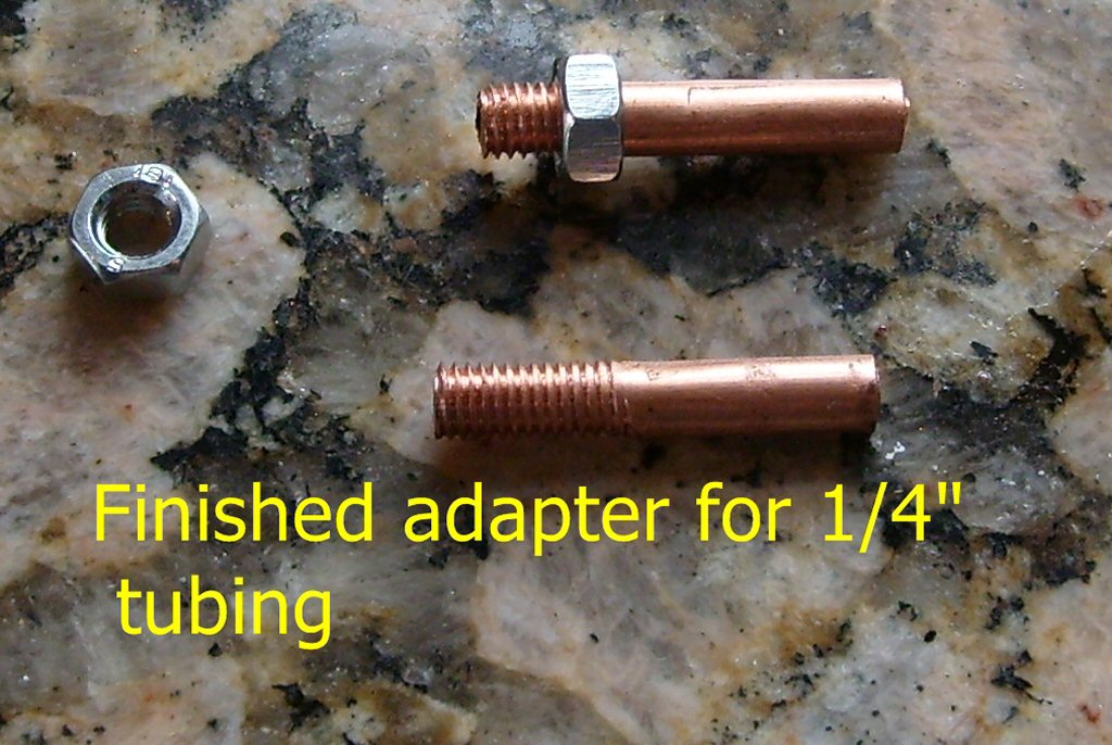 Finished adapter for 1⁄4 inch ID rubber hose.