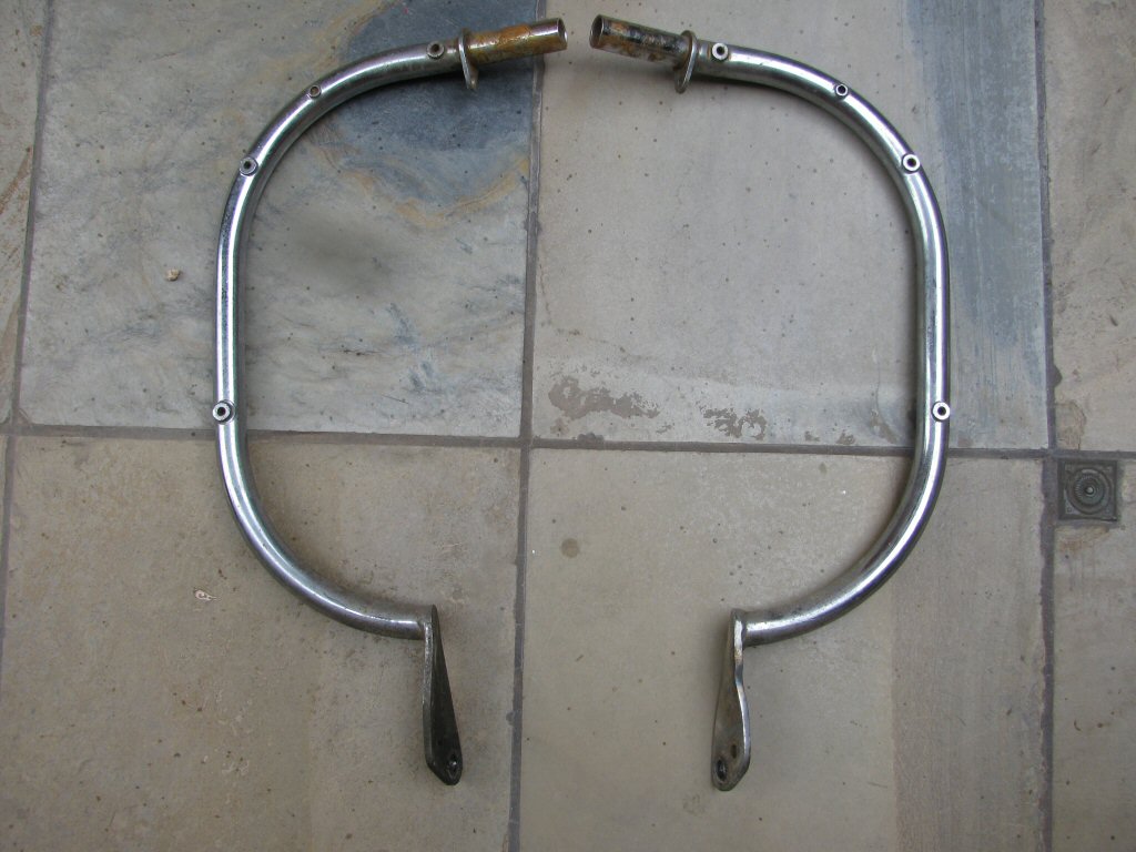 Left and right crash bars used to mount leg shields.