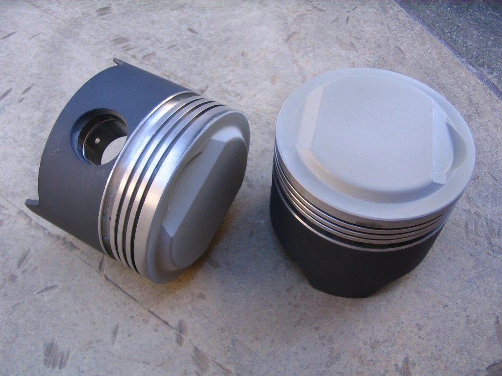 Swain Tech coated pistons, TBC on Dome and PC-9 on Skirt.