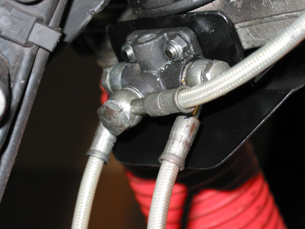 Protecting the brake lines on a Moto Guzzi Quota 1000.