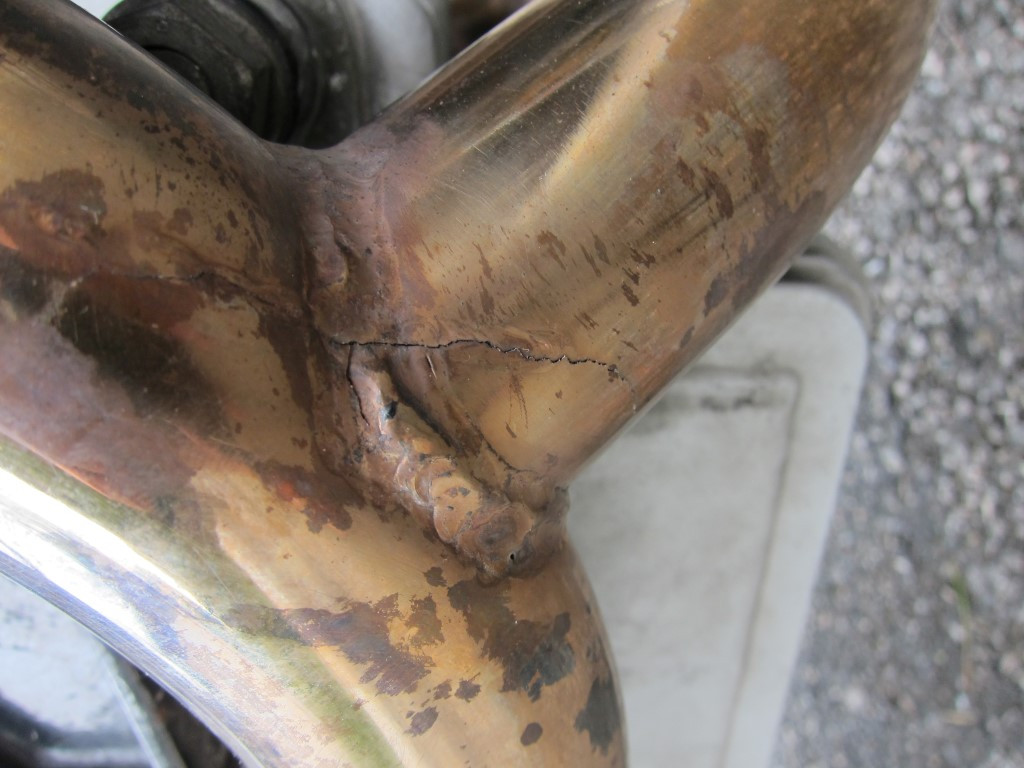Crack in the right down pipe on a Moto Guzzi Quota 11000 ES.