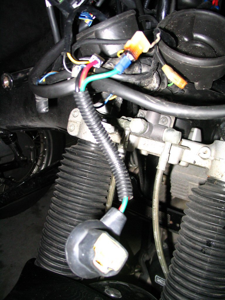 Wiring adapter, just plug in and go. Mounting a Yamaha FZR headlight to a Moto Guzzi Quota 1100 ES.