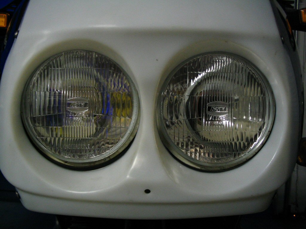 Close up view of how the headlight fits in the fairing. Mounting a Yamaha FZR headlight to a Moto Guzzi Quota 1100 ES.