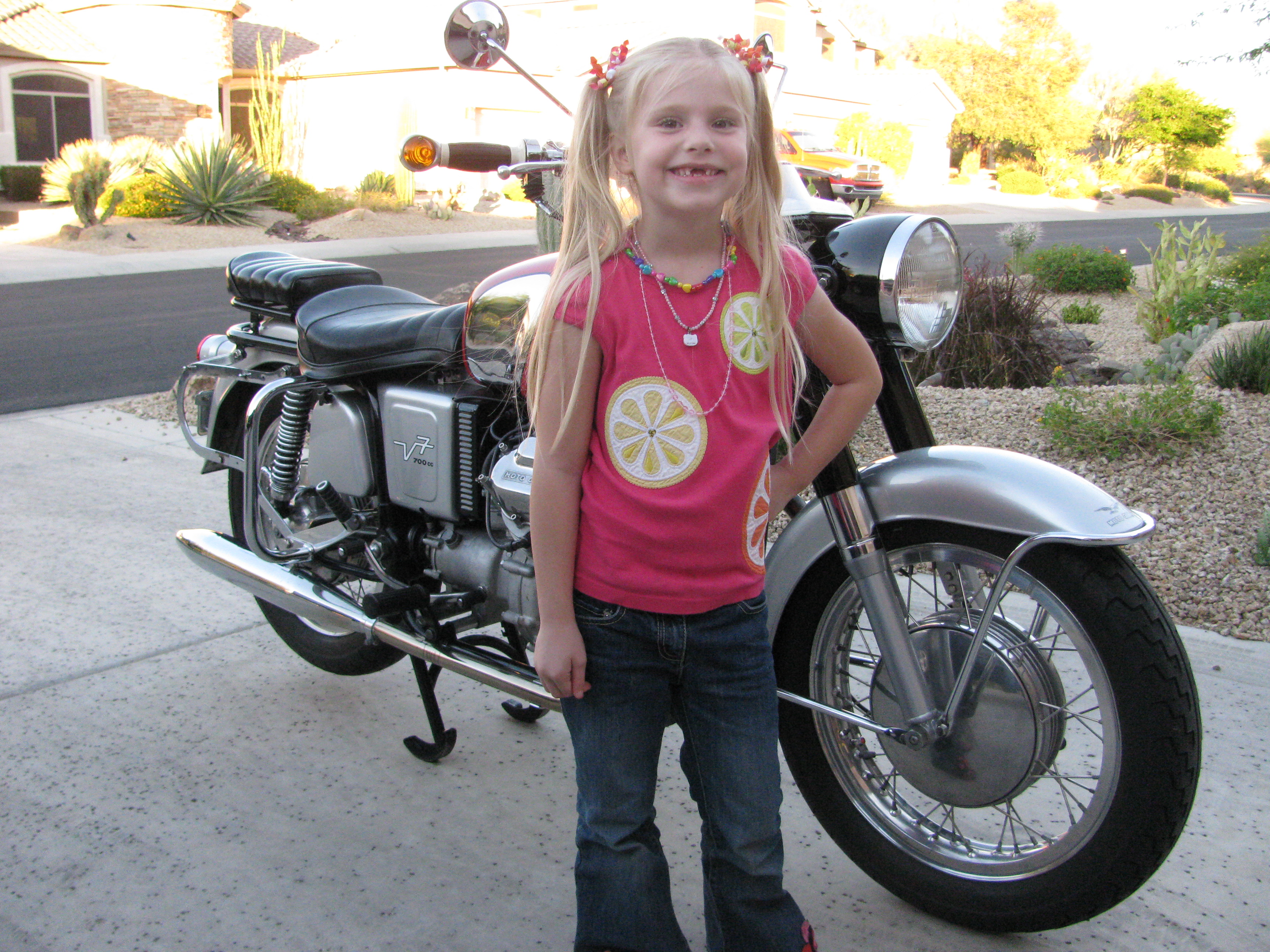 Robert Scharf's Moto Guzzi V700 with Darby Anne Bender.