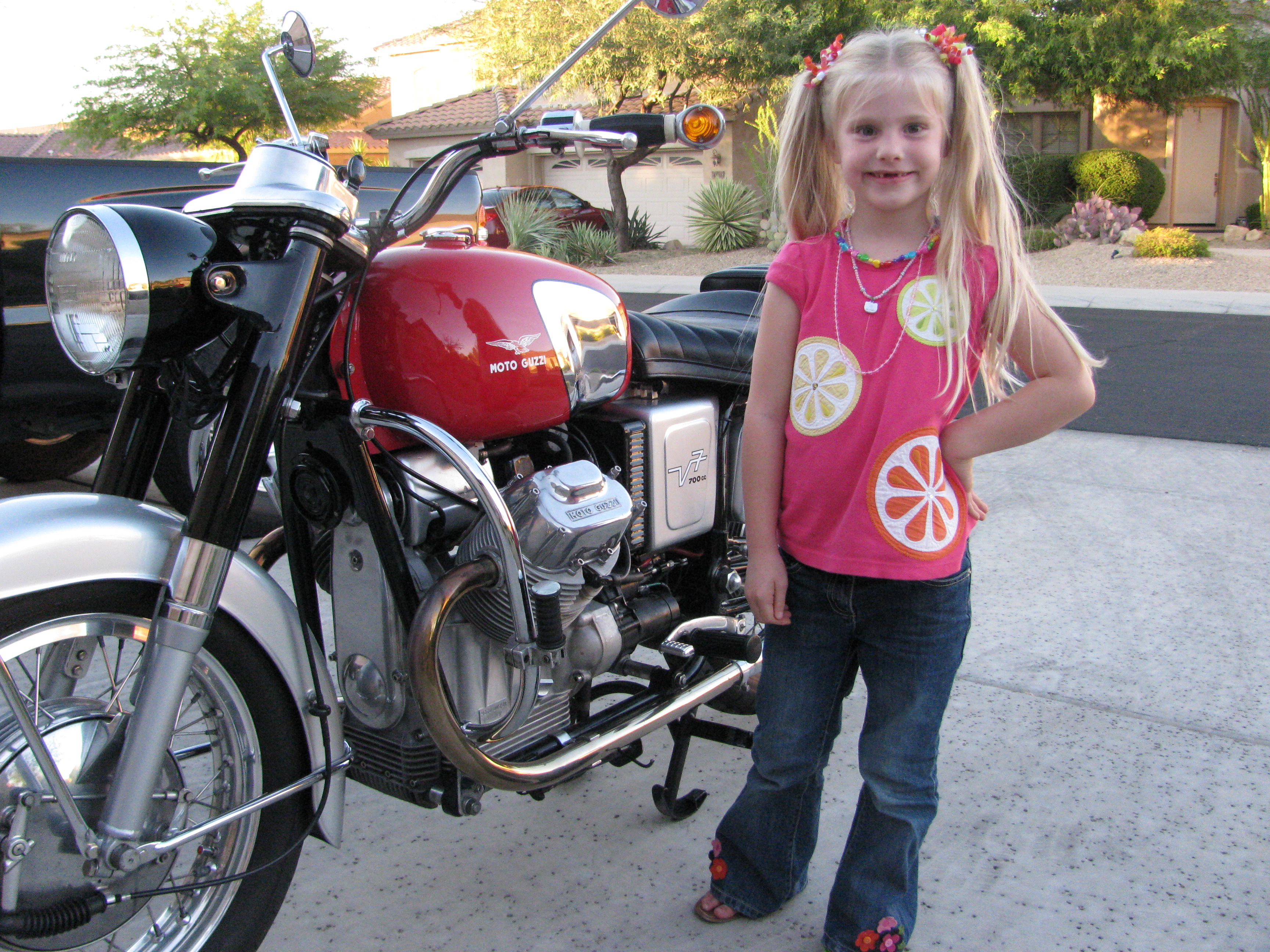 Robert Scharf's Moto Guzzi V700 with Darby Anne Bender.