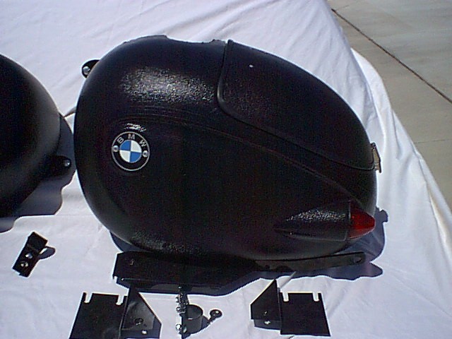 Endoro saddlebags for a BMW. Made by Luxor Marine. Shown here as an example only; shock relief will not fit a Moto Guzzi.