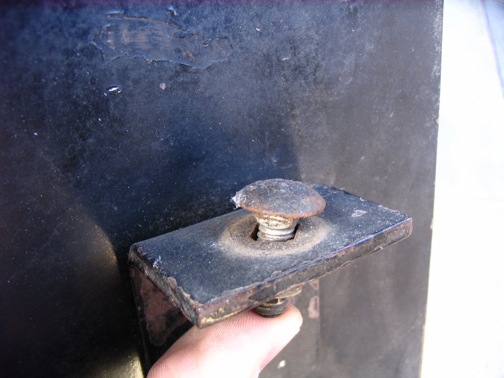 Right saddlebag: Close-up of forward facing tab. Has square hole for a carriage bolt. Perhaps a mount for an antennae? LAPD saddlebags as used on Police versions of the Moto Guzzi V700, Ambassador, and Eldorado