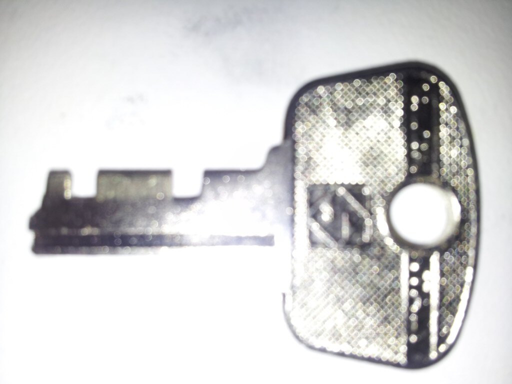 Shoei saddlebag latch key.