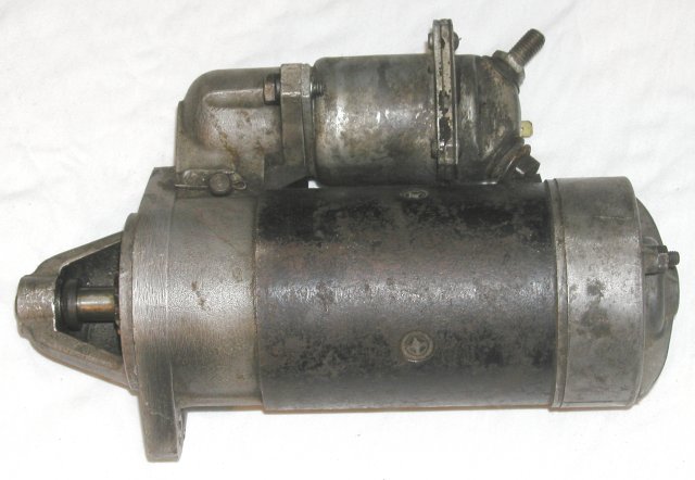 Magneti Marelli starter with a Bosch solenoid (part number 0331-300-019). Not believed to have come from Moto Guzzi, but rather an aftermarket fitment.
