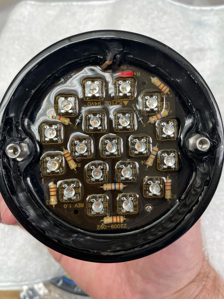 Modifying a CEV 9313 tail light with an LED for fitment to Moto Guzzi V700, V7 Special, Ambassador, 850 GT, 850 GT California, Eldorado, and 850 California Police motorcycles.