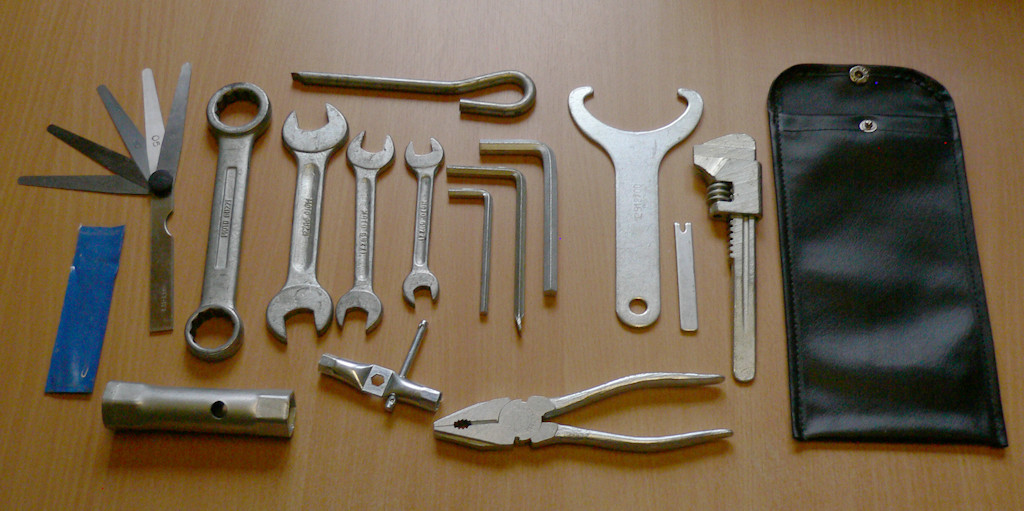 Original tool kit (MG# 17929900) for the Moto Guzzi 850 T3, 850 T3 California, Le Mans, Le Mans II, V1000 G5, V1000 I-Convert, and 1000 SP with a change over to red handled pliers possibly for the 1000 SP NT, 850 T4, and California II.