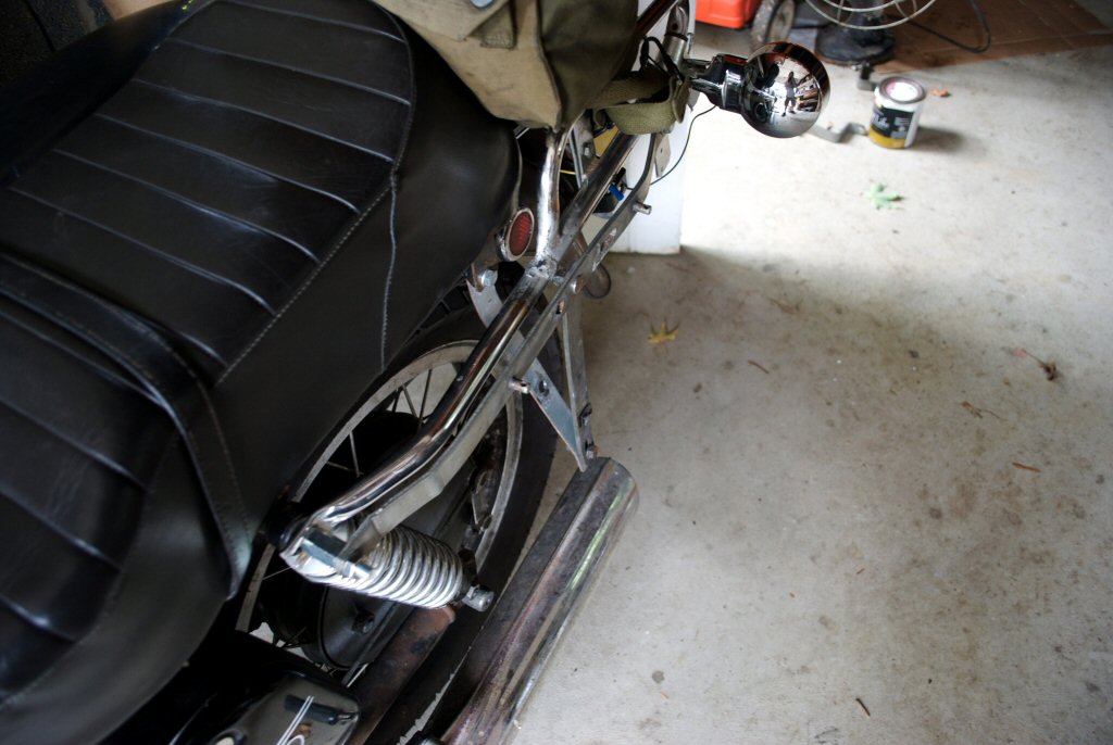 Wixom saddlebag brackets from a Suzuki adapted to a Moto Guzzi Eldorado.